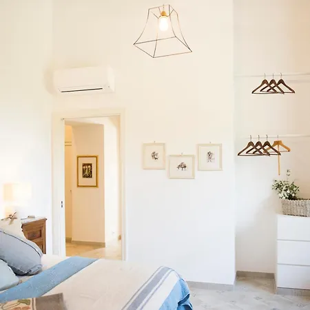 Tozzoli House *